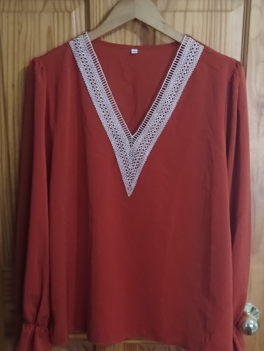 Women's Rust V-Neck Blouse with Cream Lace Trim